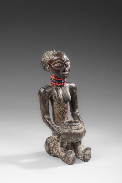 RDC/ZAÏRE - LUBA
Representation of a seated...