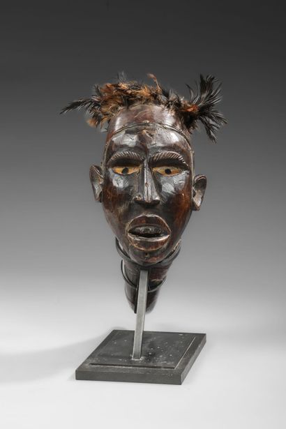 Kongo fetish and oracle with head and horn
Wood,...