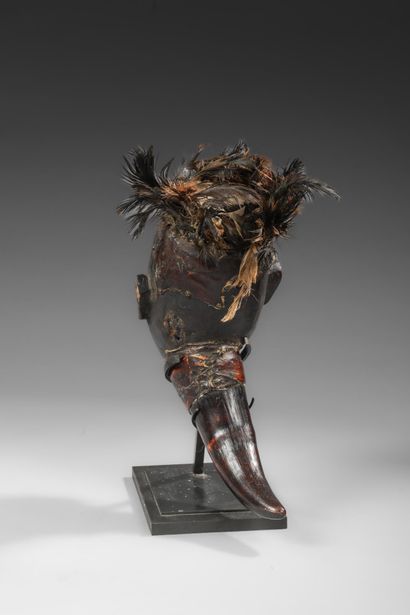 Kongo fetish and oracle with head and horn
Wood,...