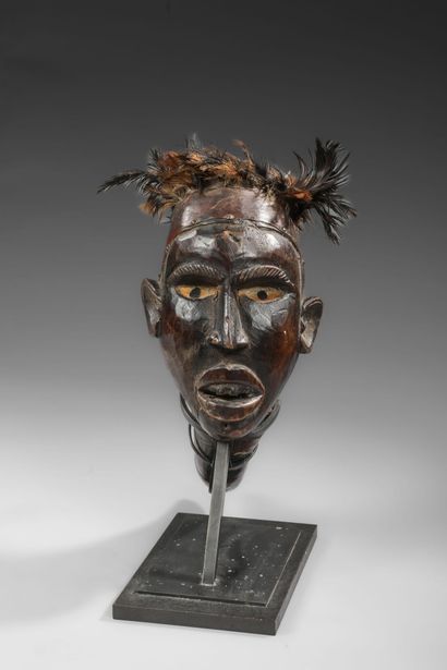 Kongo fetish and oracle with head and horn
Wood,...