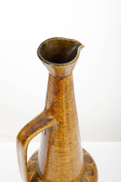 ACCOLAY 
Ochre-glazed ceramic spoon, broken...