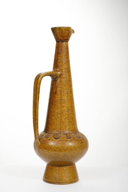 ACCOLAY 
Ochre-glazed ceramic spoon, broken...