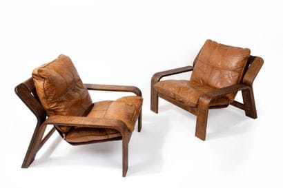 Pair of comfortable armchairs with varnished...