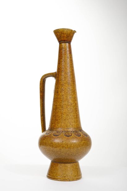 ACCOLAY 
Ochre-glazed ceramic spoon, broken...