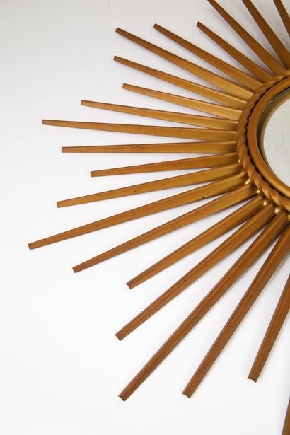 Chaty Vallauris
Witch sun mirror in gilded...