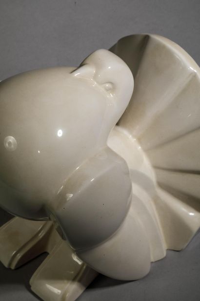 Pair of white glazed earthenware bookends...