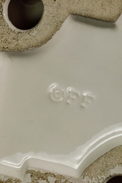 Pair of white glazed earthenware bookends...