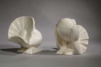 Pair of white glazed earthenware bookends...