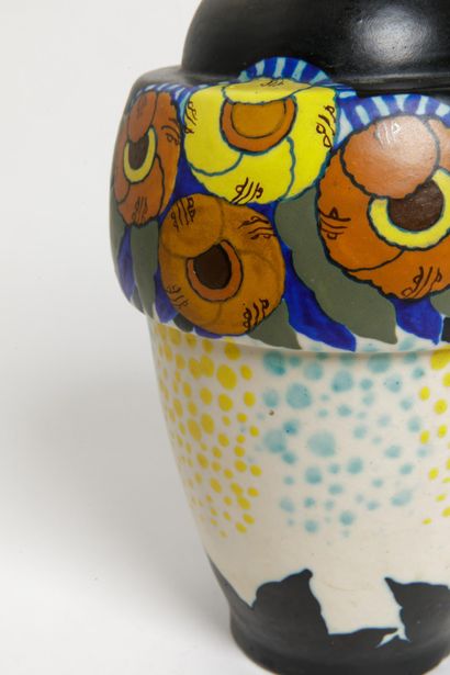 D'ARGYL
Enameled earthenware shell vase decorated...