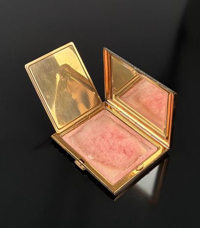 Christian Dior 
Poudrier en métal argenté...