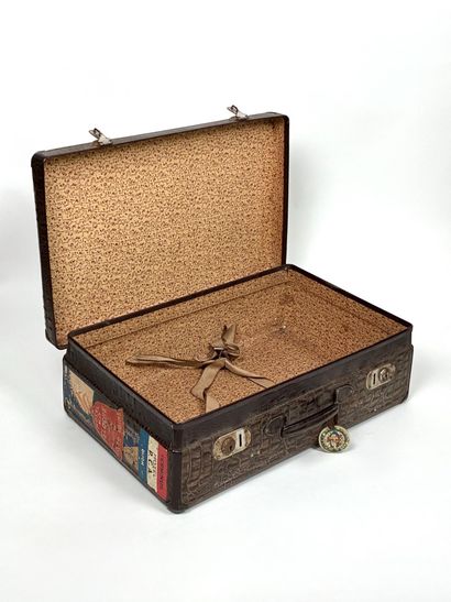Crocodile-style embossed travel case in brown...