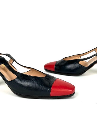 TANINO CRISCI
Navy blue leather and red toe...