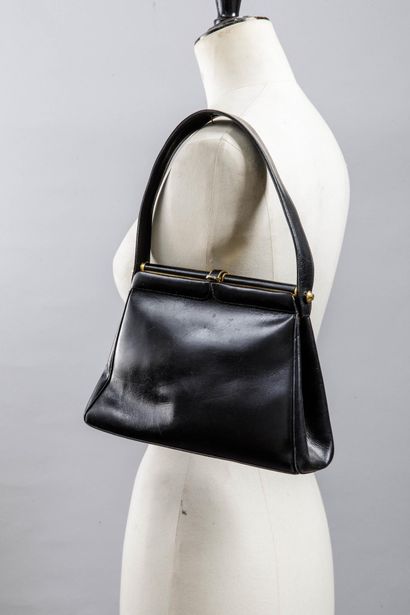 Petit sac noir doublé cuir
Travail des années...