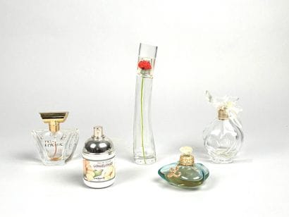Set of four empty bottles including:
Cacharel,...