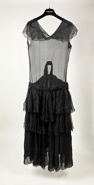 Ensemble de 4 robes noires de différentes...