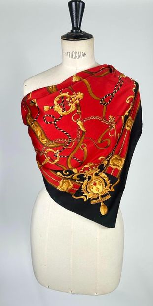 Set of two silk squares including: 
- Red,...