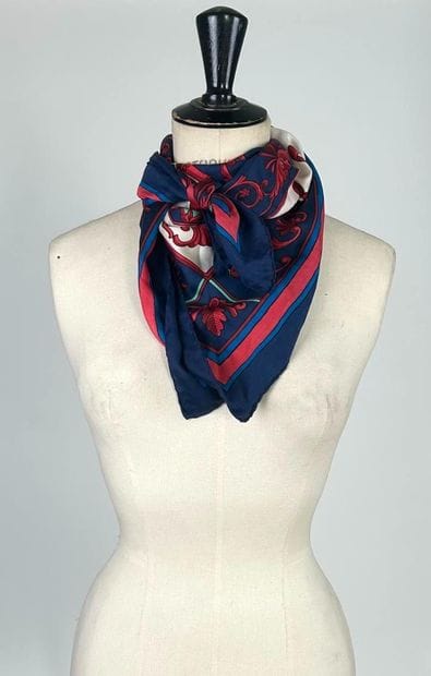 Set of two silk squares including: 
- Red,...