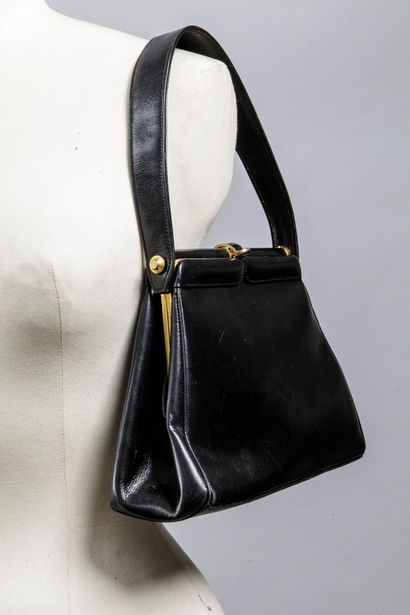 Petit sac noir doublé cuir
Travail des années...