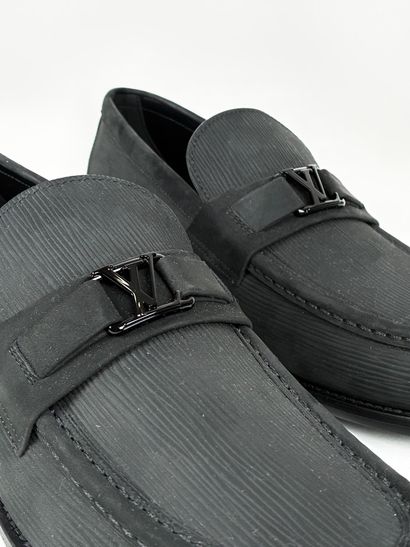 LOUIS VUITTON
Paire de mocassins d'homme...