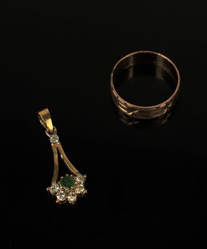 A ring in finely chased gold-plated metal...