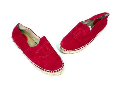 CHANEL
Pair of red espadrilles embellished...