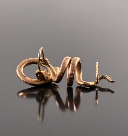 Original snake earring in gilded and pink...