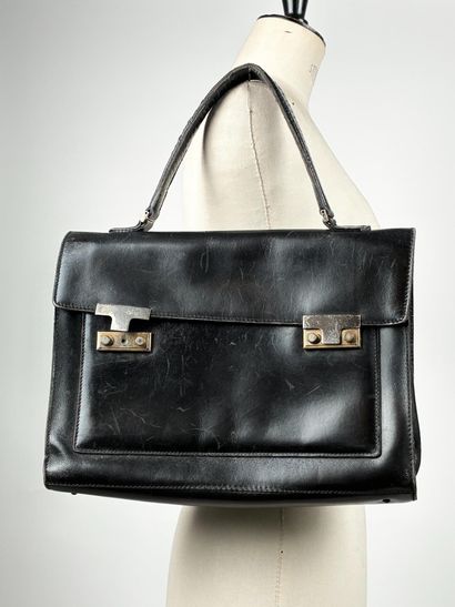 Dans le Goût de LANCEL
Sac cartable en cuir...