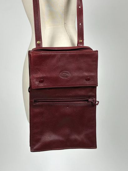 LONGCHAMP
Rectangular burgundy leather bag...