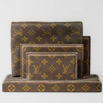 Louis VUITTON 
Three-compartment leather...