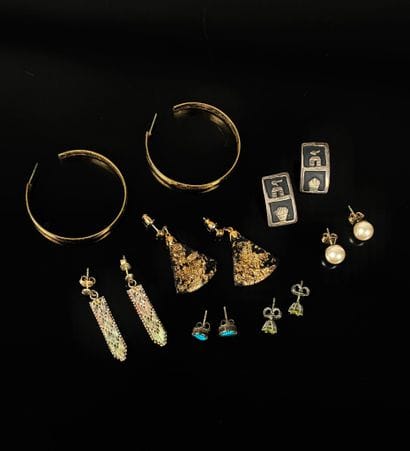 A set of seven pairs of earrings, including...