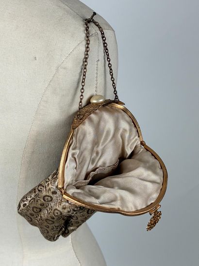 Reunion of two evening bags, including: 
A...