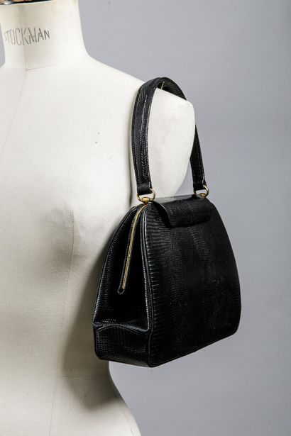 Sac en cuir de lézard noir, la doublure en...