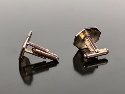 Paire de boutons de manchette en métal argenté...