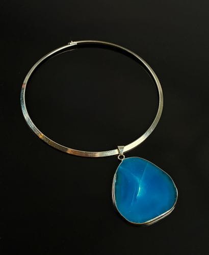 Torque necklace with blue stone pendant
L:...