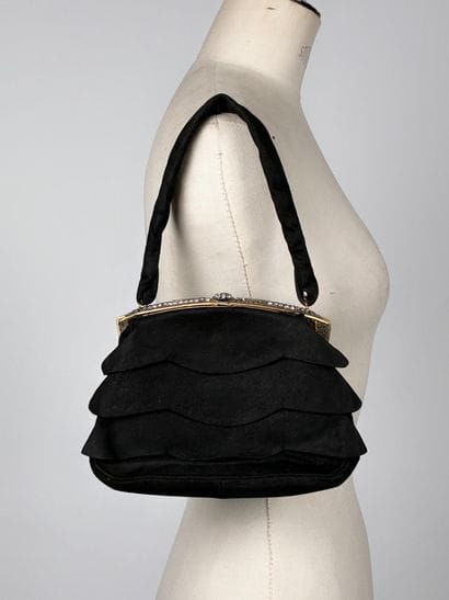 Reunion of two evening bags, including: 
A...