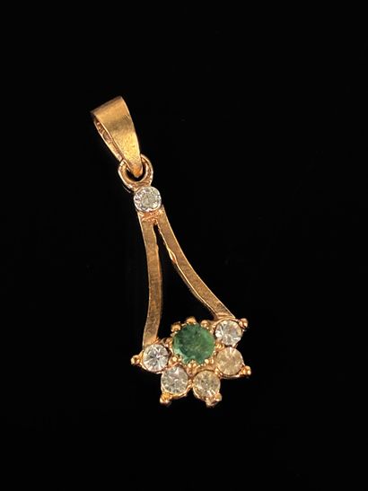 A ring in finely chased gold-plated metal...