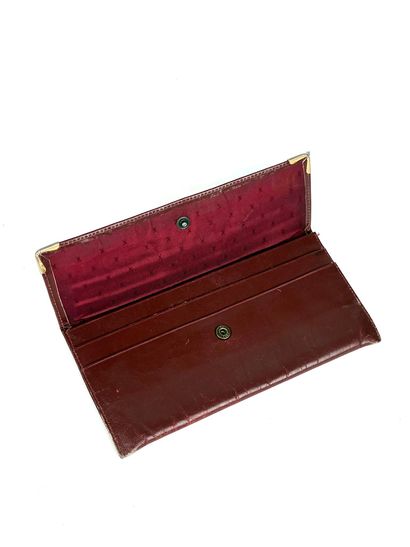 CARTIER
Set of a small wallet and card holder...