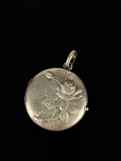 Pendentif formant porte-photo rond en argent...