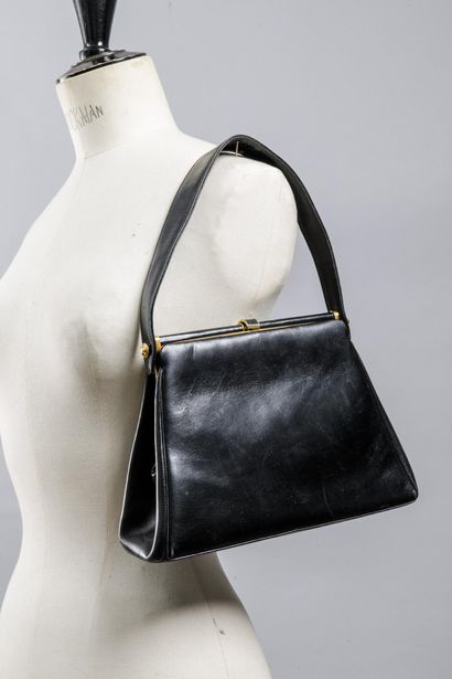 Petit sac noir doublé cuir
Travail des années...