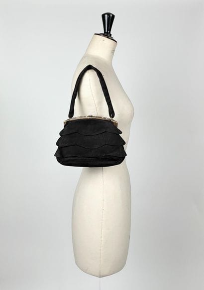 Reunion of two evening bags, including: 
A...