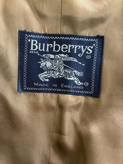 BURBERRY'S
Wool coat 
Size 38 
Stains on...