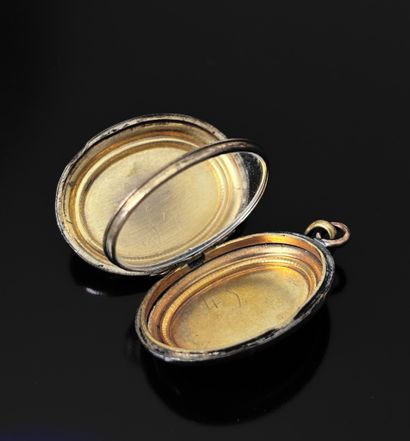 Gilded metal medallion pendant engraved with...