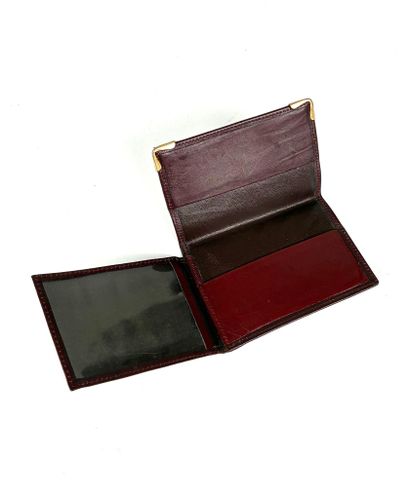 CARTIER
Set of a small wallet and card holder...