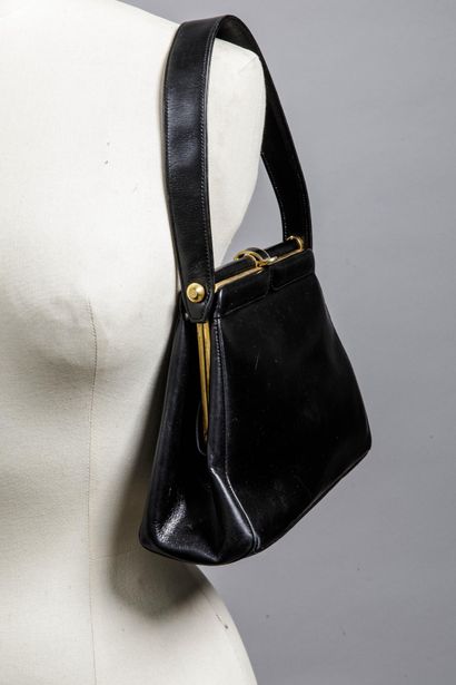 Petit sac noir doublé cuir
Travail des années...