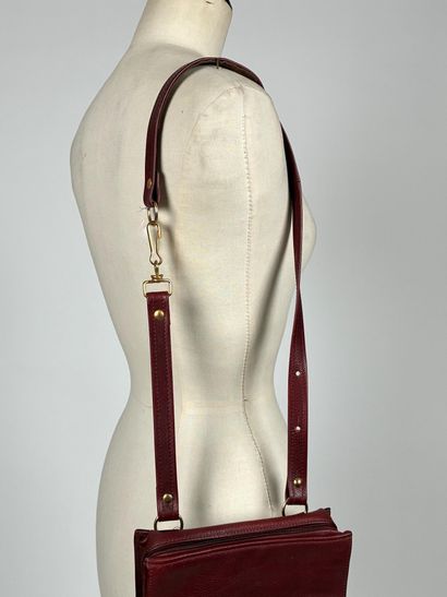 LONGCHAMP
Rectangular burgundy leather bag...