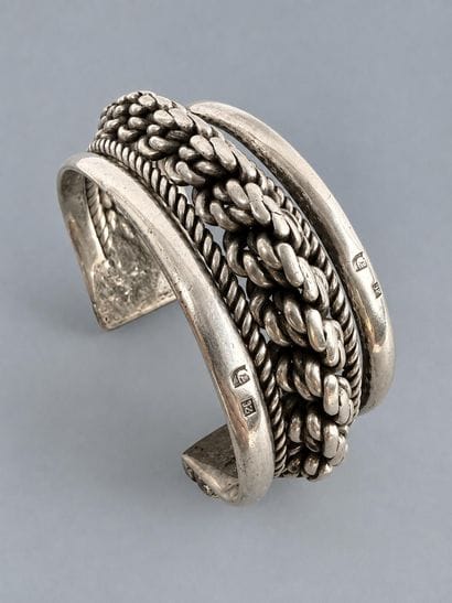 Silver torque bracelet with a chain motif
Made...