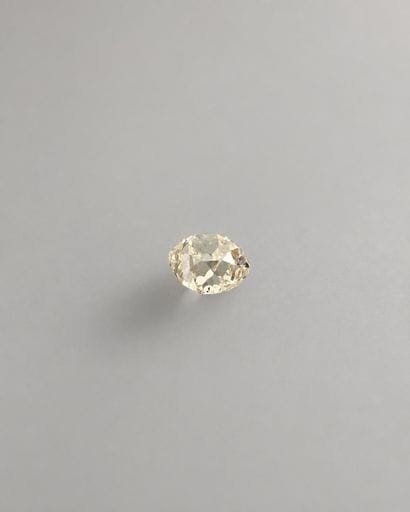 Very slightly yellow cushion-cut diamond...