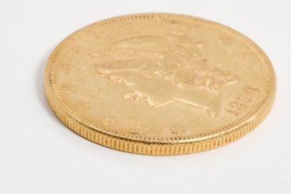 Une pièce de 20 dollars or datée de 1858...