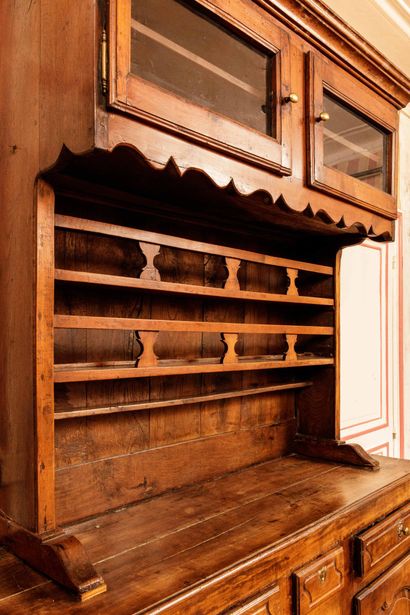 Natural wood sideboard with molded and carved...