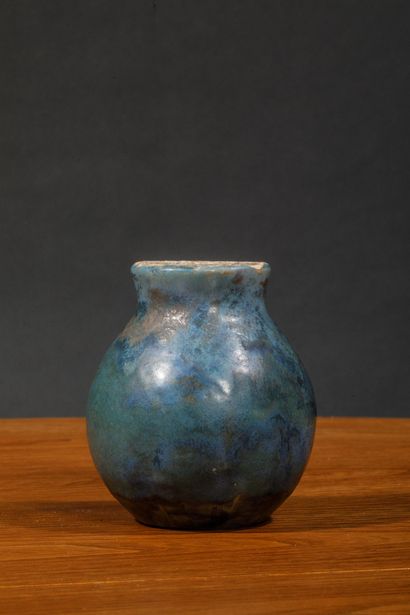 Turquoise blue glazed stoneware vase with...